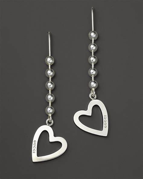 gucci trademark silver earrings|gucci heart toggle earrings.